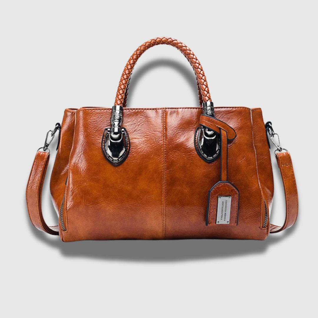 Pochette en cuir avec poignée tressée – Spacieuse, chic et convertible