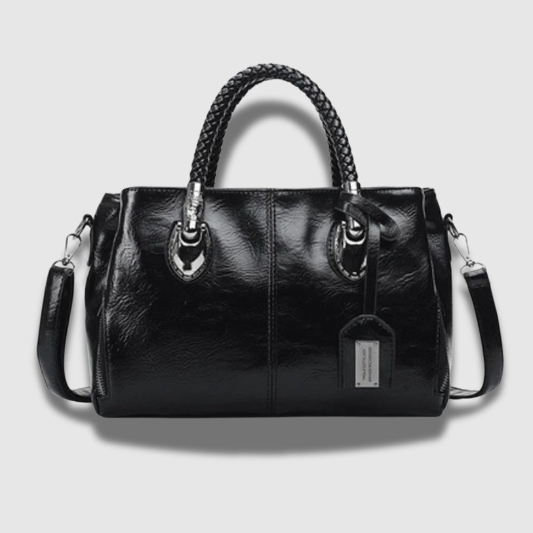 Pochette en cuir avec poignée tressée – Spacieuse, chic et convertible