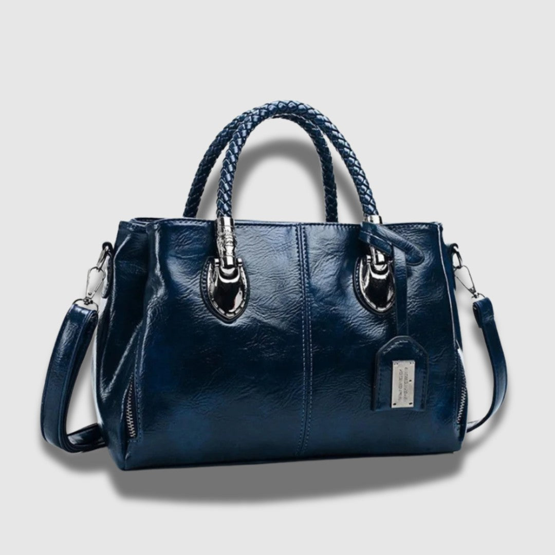 Pochette en cuir avec poignée tressée – Spacieuse, chic et convertible
